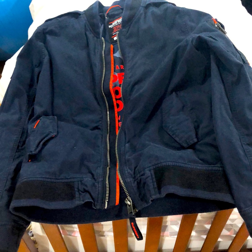 Super dry men’s jacket . 2x used . Great condition